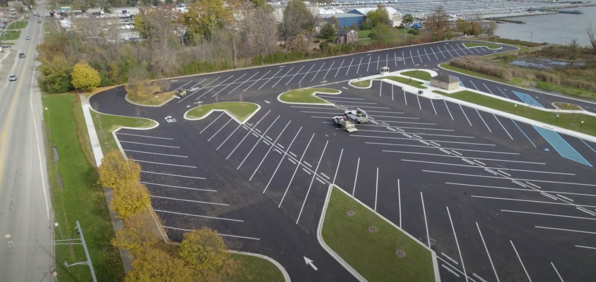 Aerial view of professionally maintained commercial landscaping with mature trees